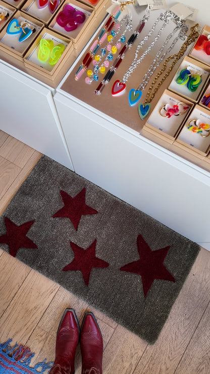 tapis étoile bordeaux