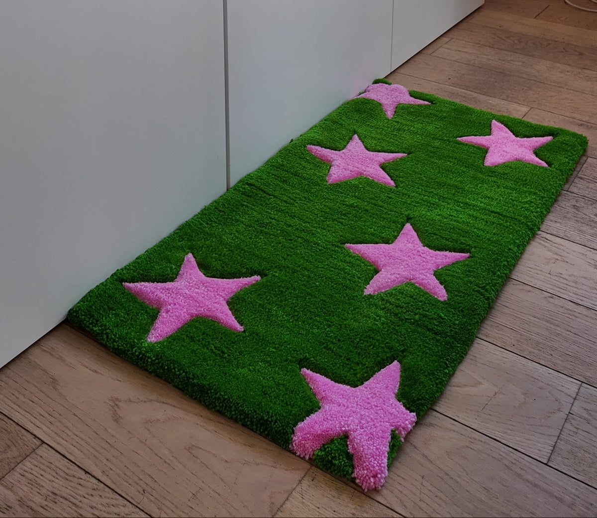 tapis étoile rose